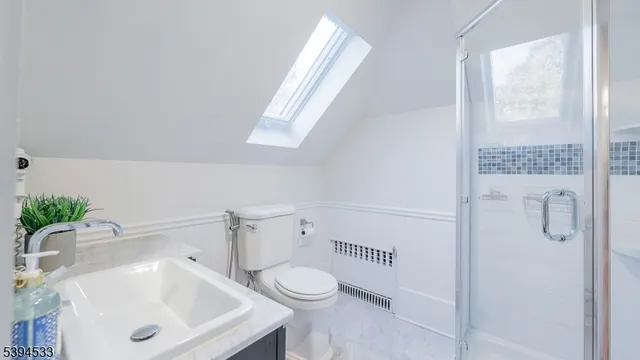 a bathroom with a sink a toilet and tub