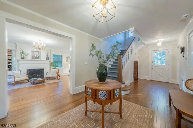 a view of a livingroom with furniture and a fireplace