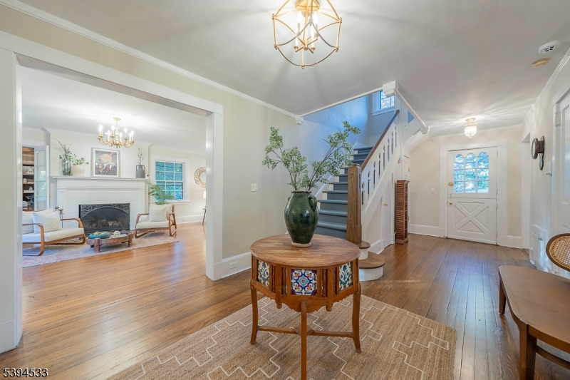 16 W Road Short Hills, NJ 07078 - Photo 5 of 47 a view of a livingroom with furniture and a fireplace