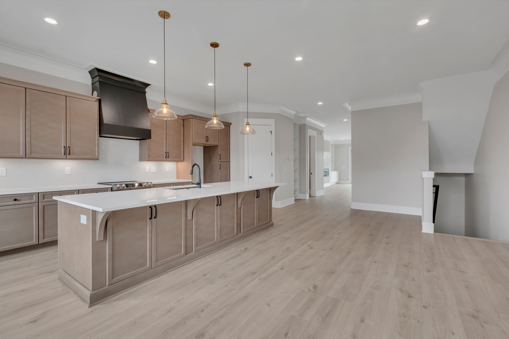 1445 Doc Johns Boulevard Murfreesboro, TN 37128 - Photo 16 of 54 a large kitchen with stainless steel appliances kitchen island a large island in the center