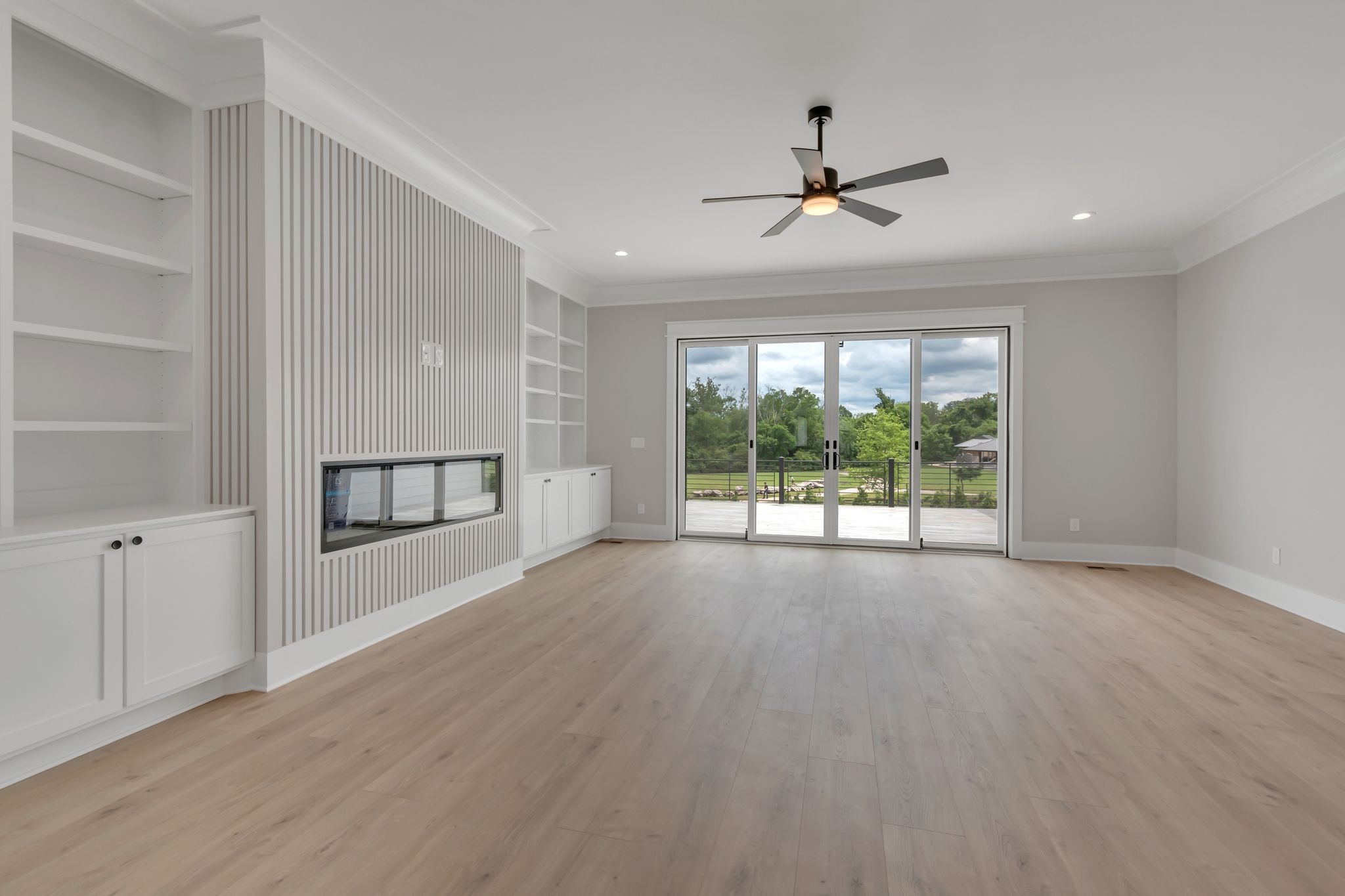 1445 Doc Johns Boulevard Murfreesboro, TN 37128 - Photo 20 of 54 wooden floor chandelier and windows in a room