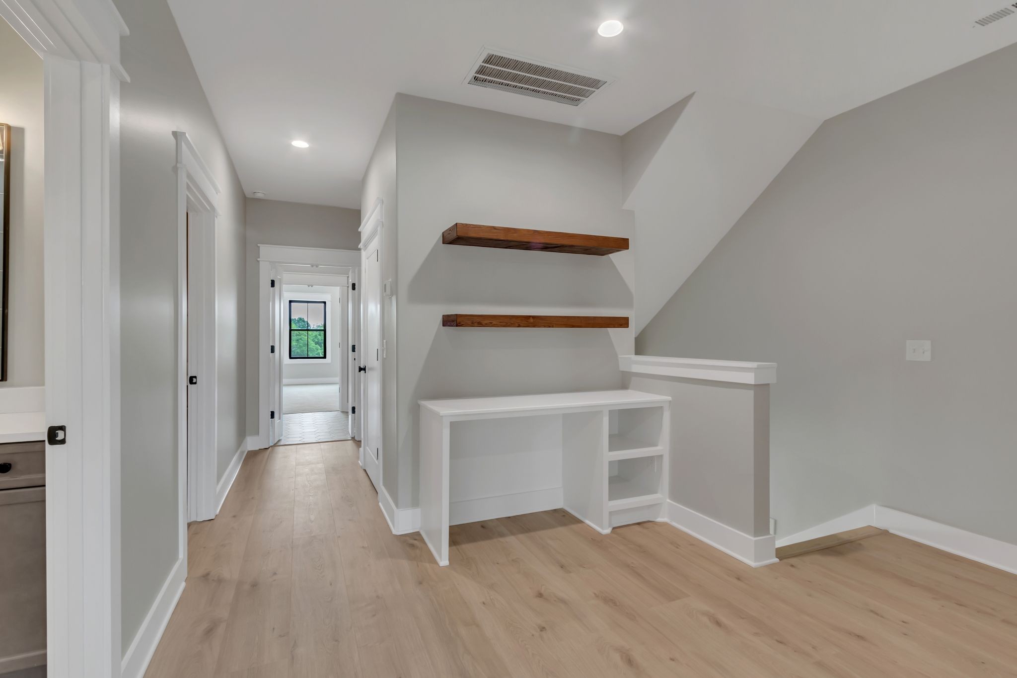 1445 Doc Johns Boulevard Murfreesboro, TN 37128 - Photo 29 of 54 a view of a hallway with wooden floor and entryway