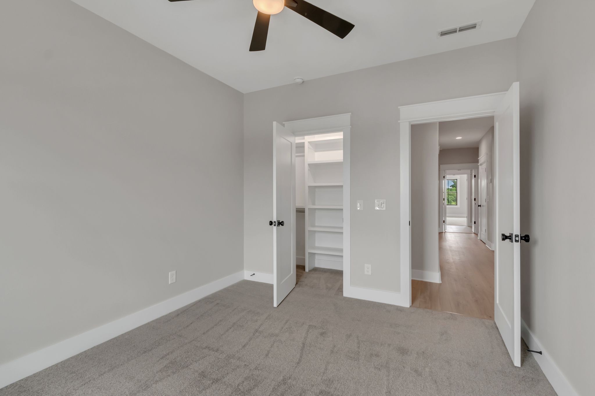 1445 Doc Johns Boulevard Murfreesboro, TN 37128 - Photo 33 of 54 an empty room with closet and a ceiling fan