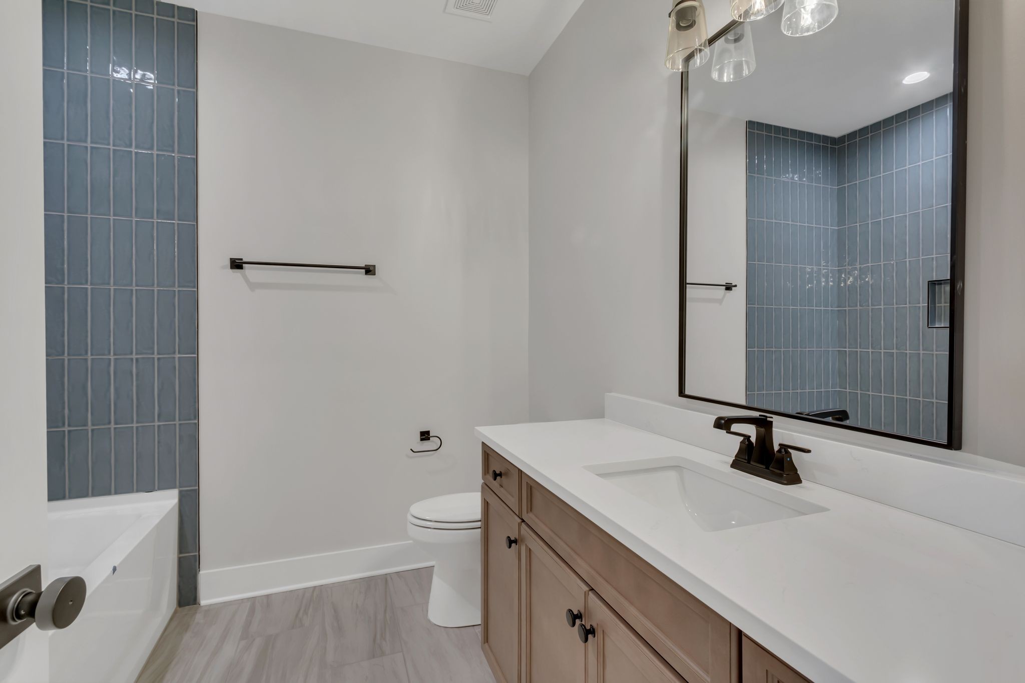 1445 Doc Johns Boulevard Murfreesboro, TN 37128 - Photo 34 of 54 a bathroom with a sink a toilet and shower