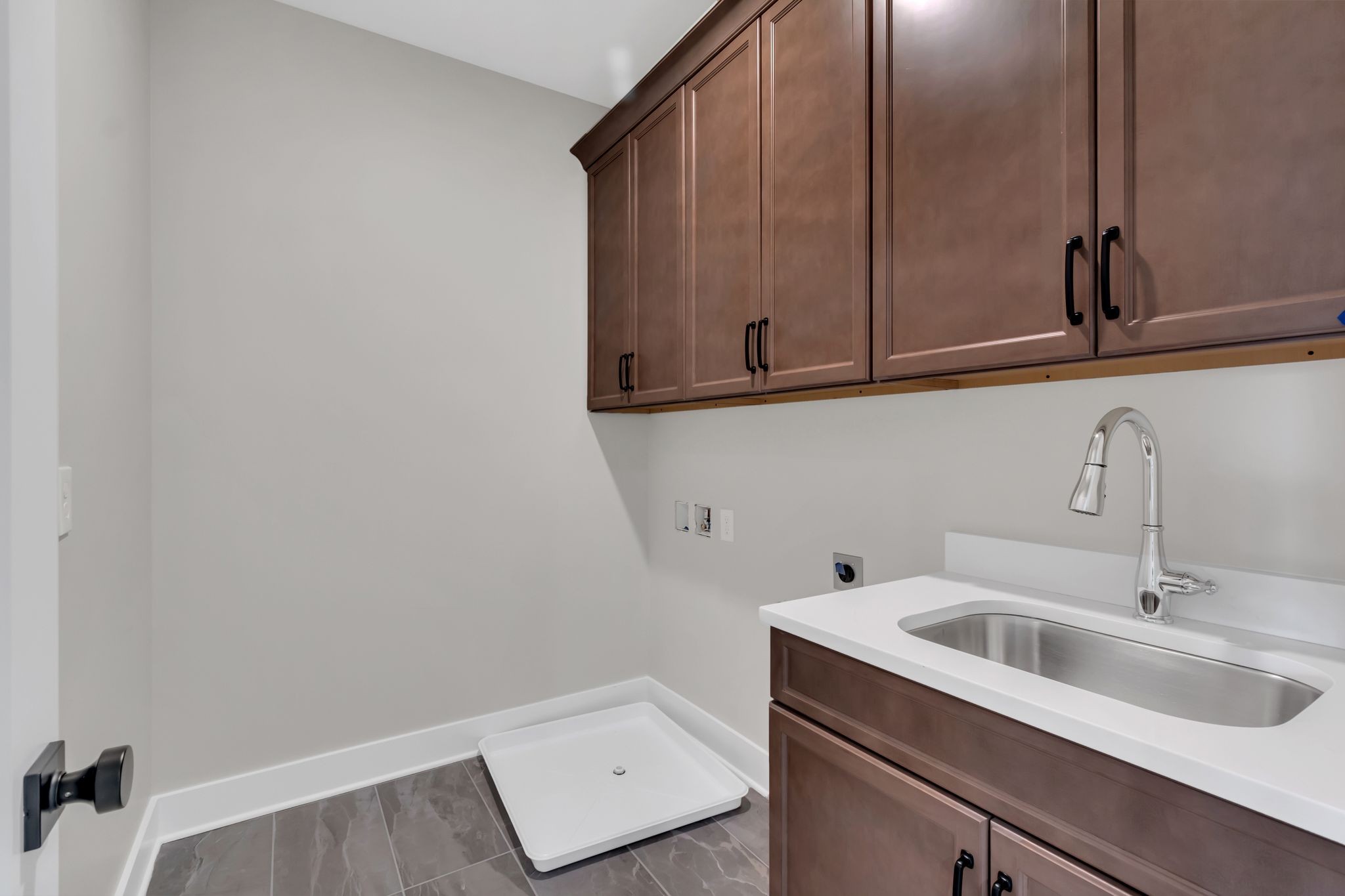 1445 Doc Johns Boulevard Murfreesboro, TN 37128 - Photo 35 of 54 a bathroom with a sink and cabinets