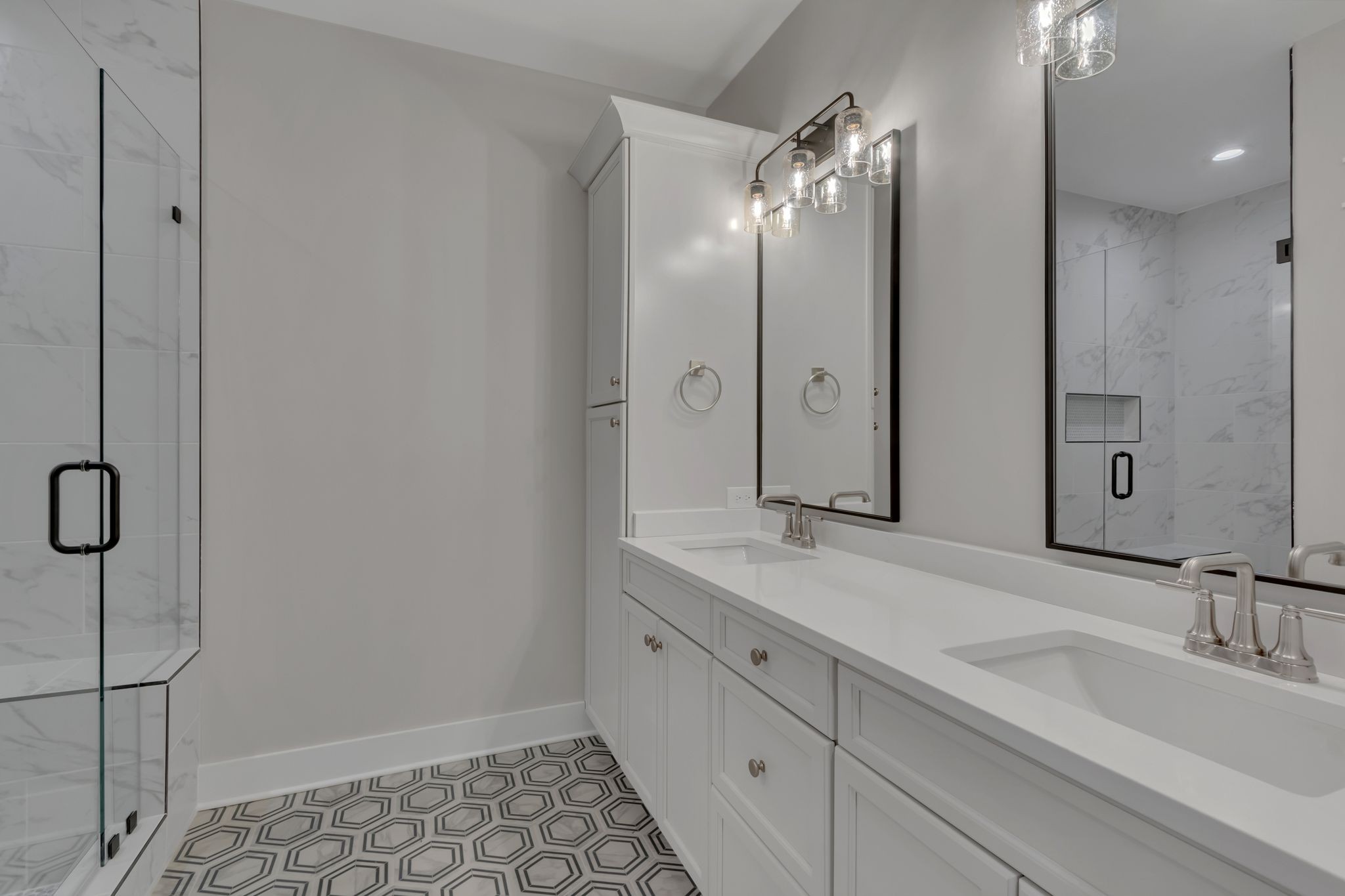 1445 Doc Johns Boulevard Murfreesboro, TN 37128 - Photo 36 of 54 a bathroom with a double vanity sink mirror and shower