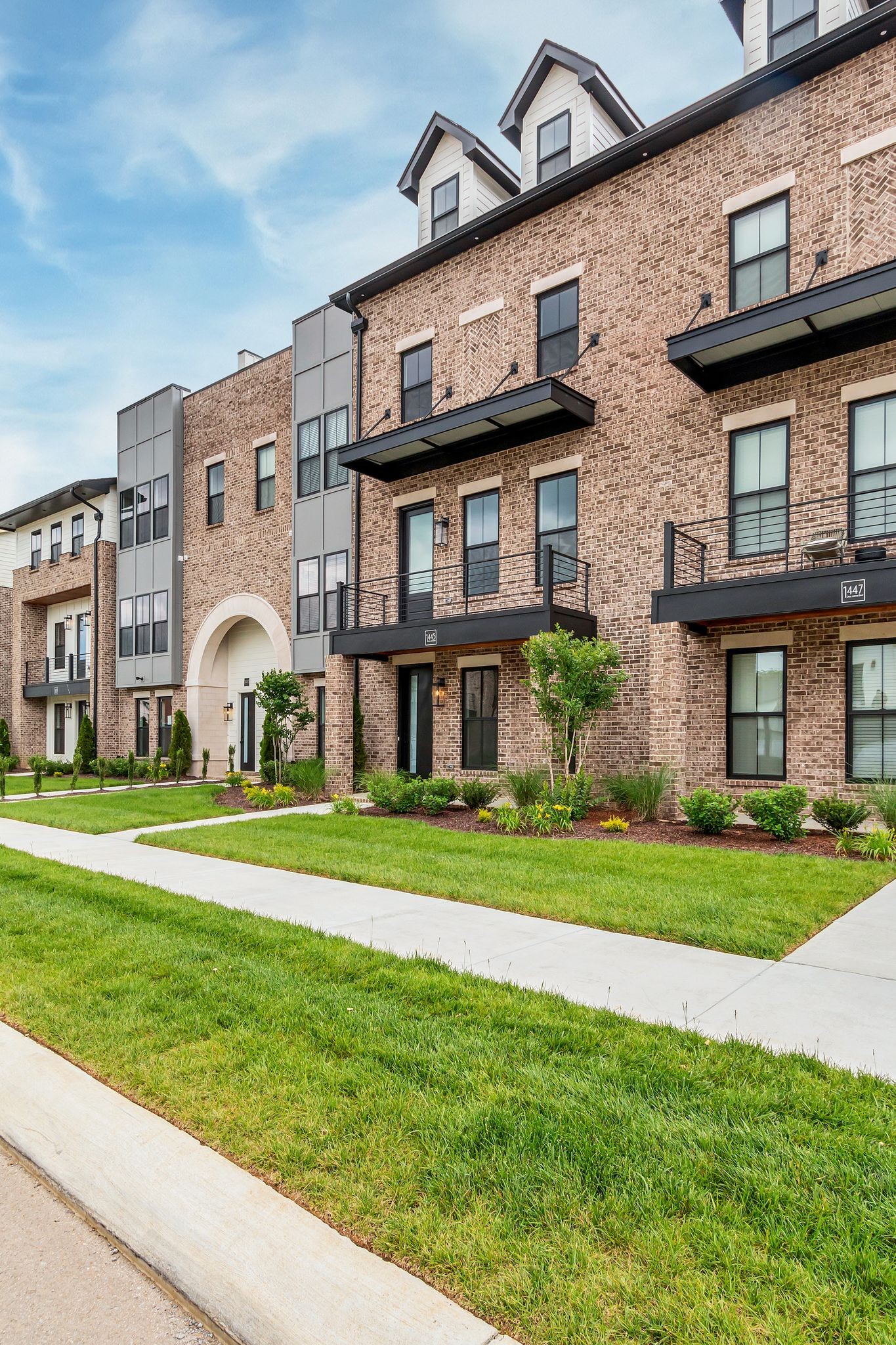 1445 Doc Johns Boulevard Murfreesboro, TN 37128 - Photo 4 of 54 a view of a big building with a big yard and large trees