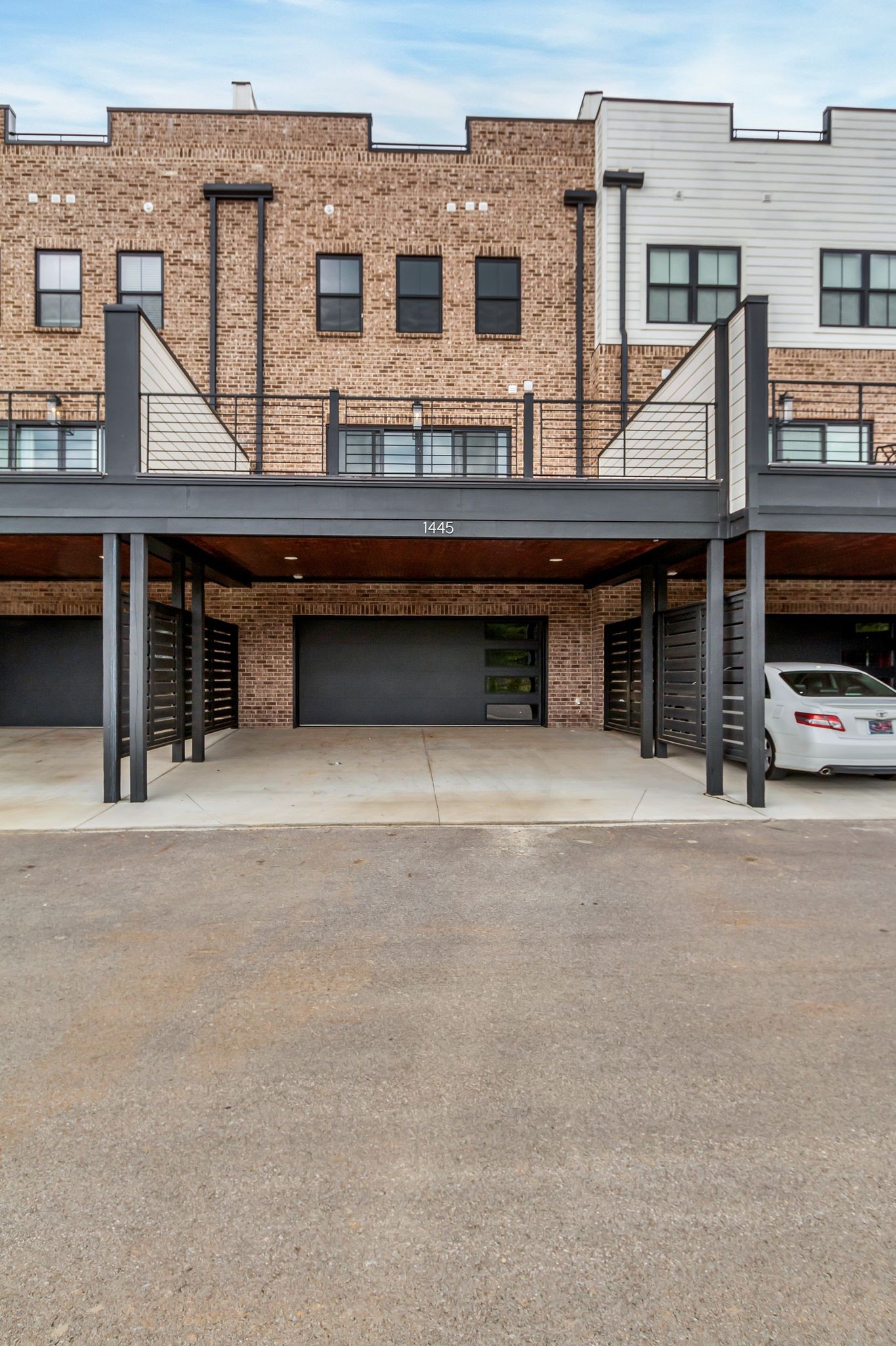 1445 Doc Johns Boulevard Murfreesboro, TN 37128 - Photo 47 of 54 a view of a building with many windows