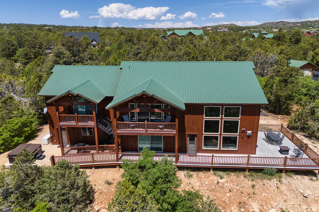 755 South Zion Ridge Drive Orderville, UT 84758 - Photo 7 of 84 Rear view of property with a wooden deck and a metal roof