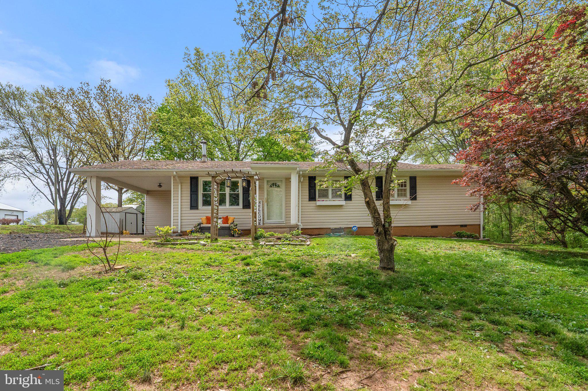 14615 Vint Hill Road Nokesville, VA 20181 - Photo 1 of 32 front view of a house with a yard
