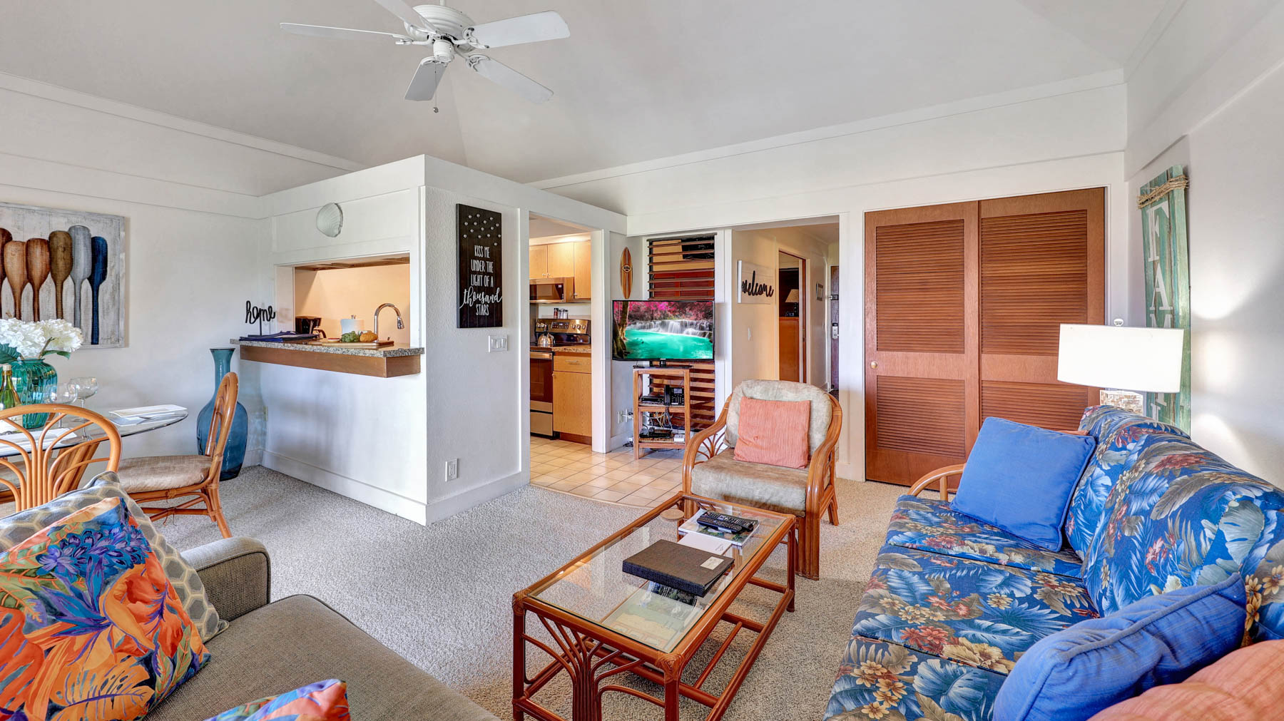 2253 Poipu Road, Unit 218 Koloa, HI 96756 - Photo 6 of 23 a living room with furniture and a window