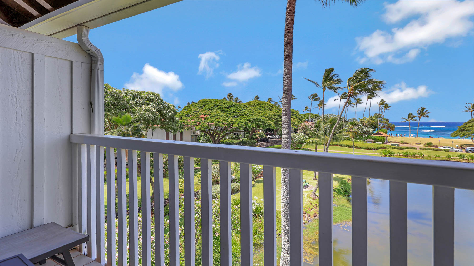2253 Poipu Road, Unit 218 Koloa, HI 96756 - Photo 8 of 23 a view of a balcony with wooden floor