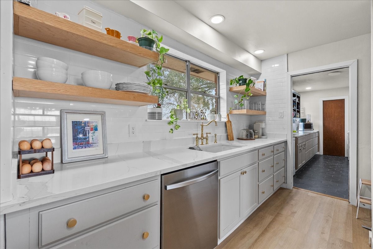 10803 Oberrender Road Needville, TX 77461 - Photo 13 of 36 a kitchen with sink and large window
