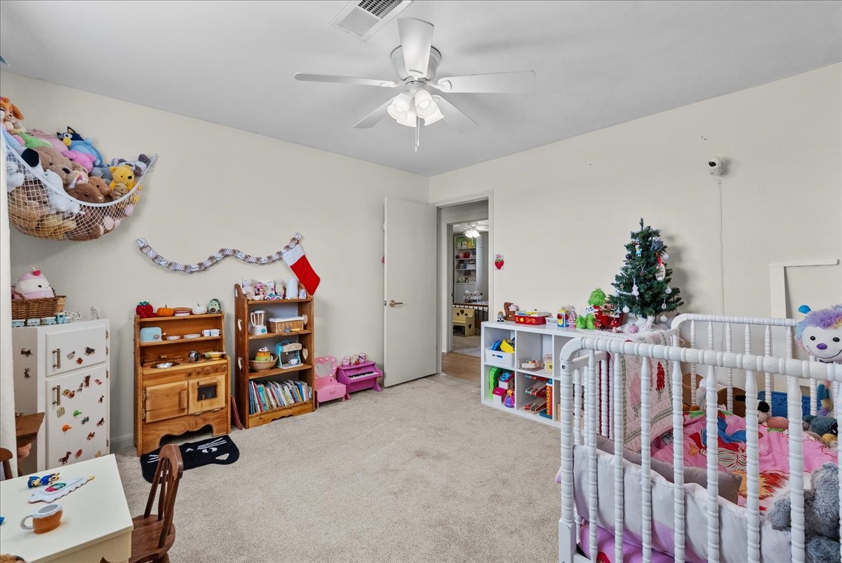 10803 Oberrender Road Needville, TX 77461 - Photo 27 of 36 a play room with toys