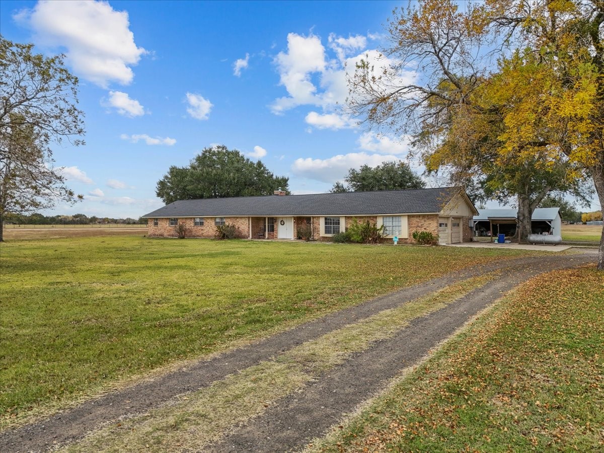 10803 Oberrender Road Needville, TX 77461 - Photo 5 of 36 a front view of house with yard