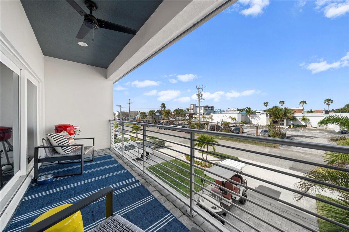 223 6th Avenue Indialantic, FL 32903 - Photo 16 of 26 a view of a balcony with chairs