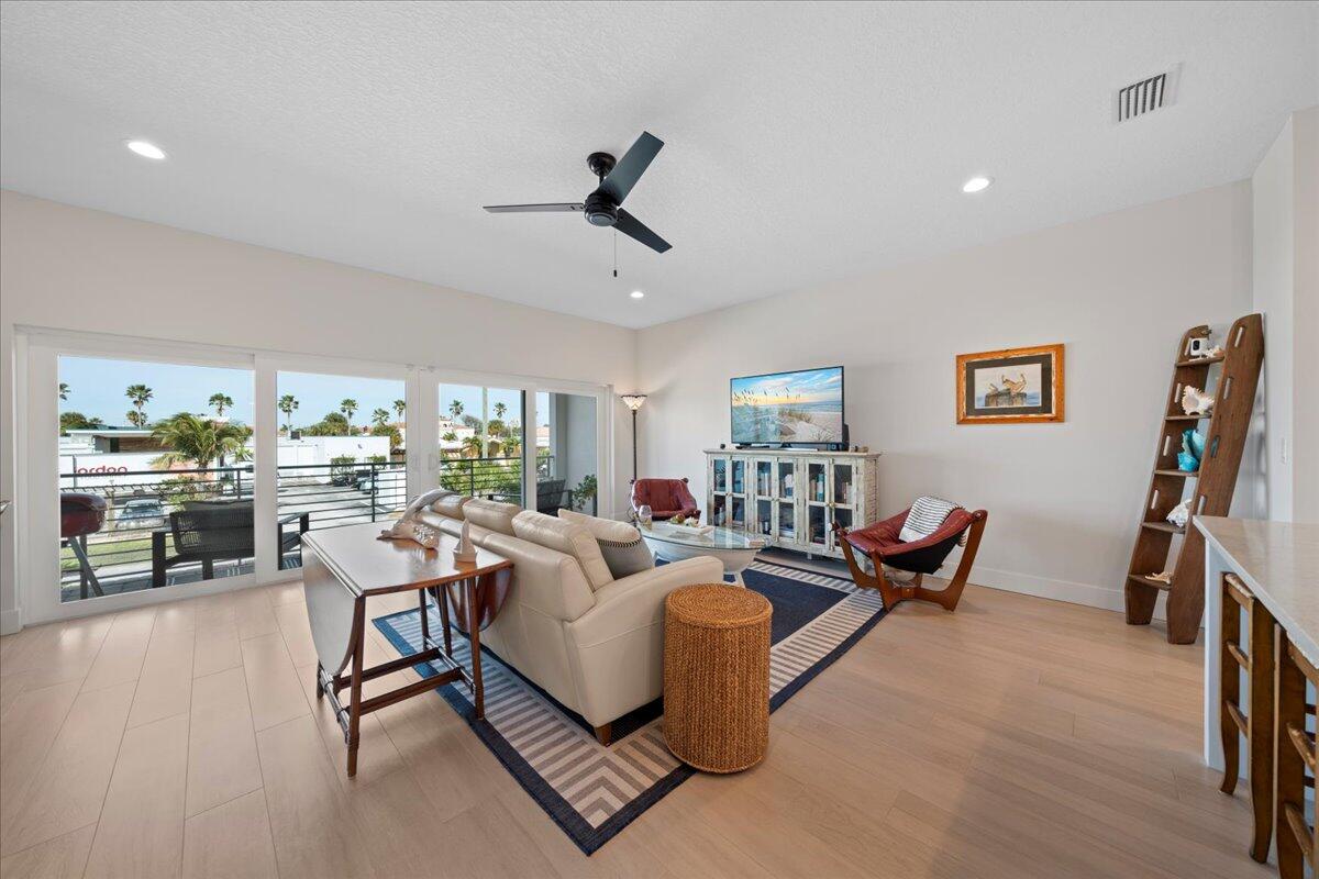 223 6th Avenue Indialantic, FL 32903 - Photo 2 of 26 a living room with furniture
