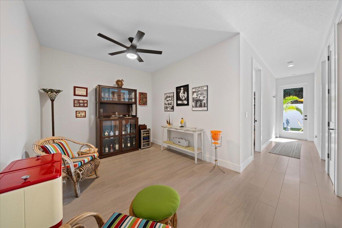 223 6th Avenue Indialantic, FL 32903 - Photo 7 of 26 a living room with furniture and wooden floor