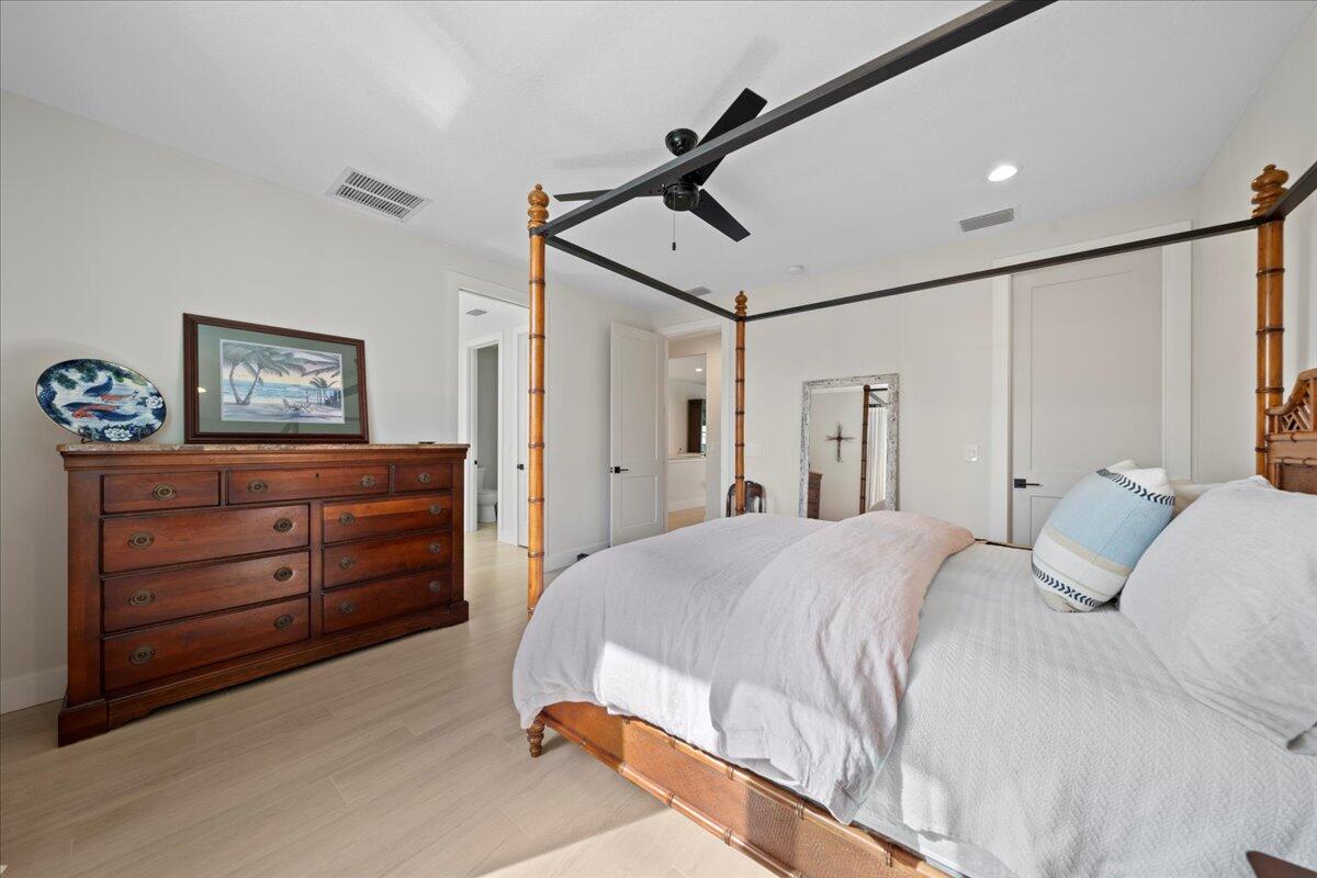 223 6th Avenue Indialantic, FL 32903 - Photo 9 of 26 a bedroom with a bed and a dresser