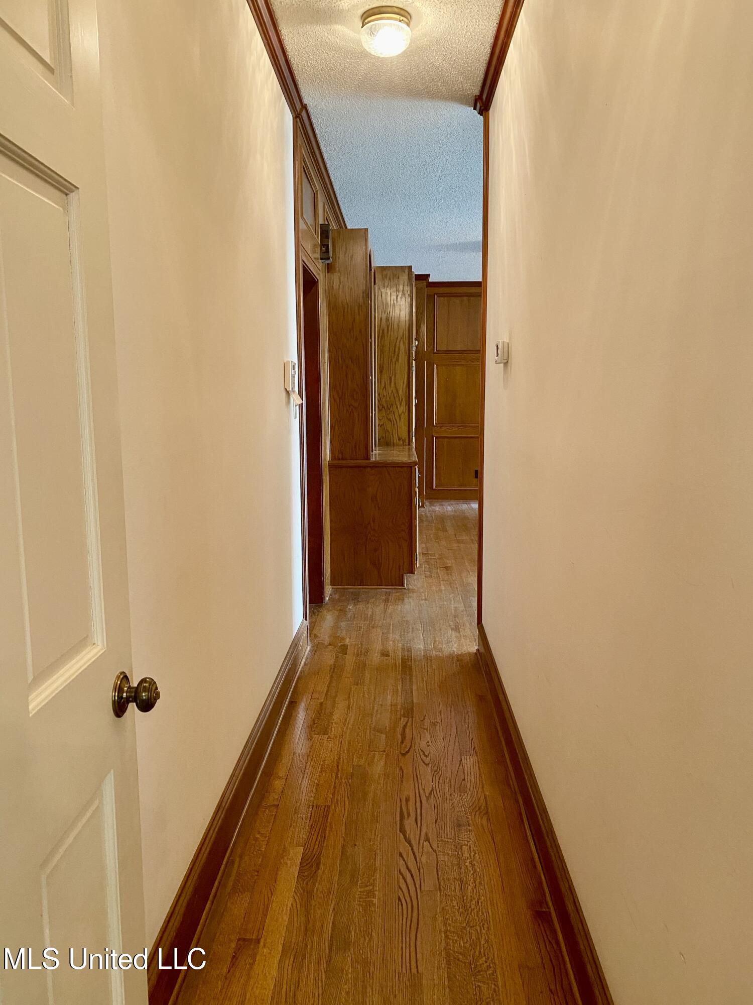 299 Quitman Perry Road Carriere, MS 39426 - Photo 13 of 76 13, Hallway downstairs, IMG_5886