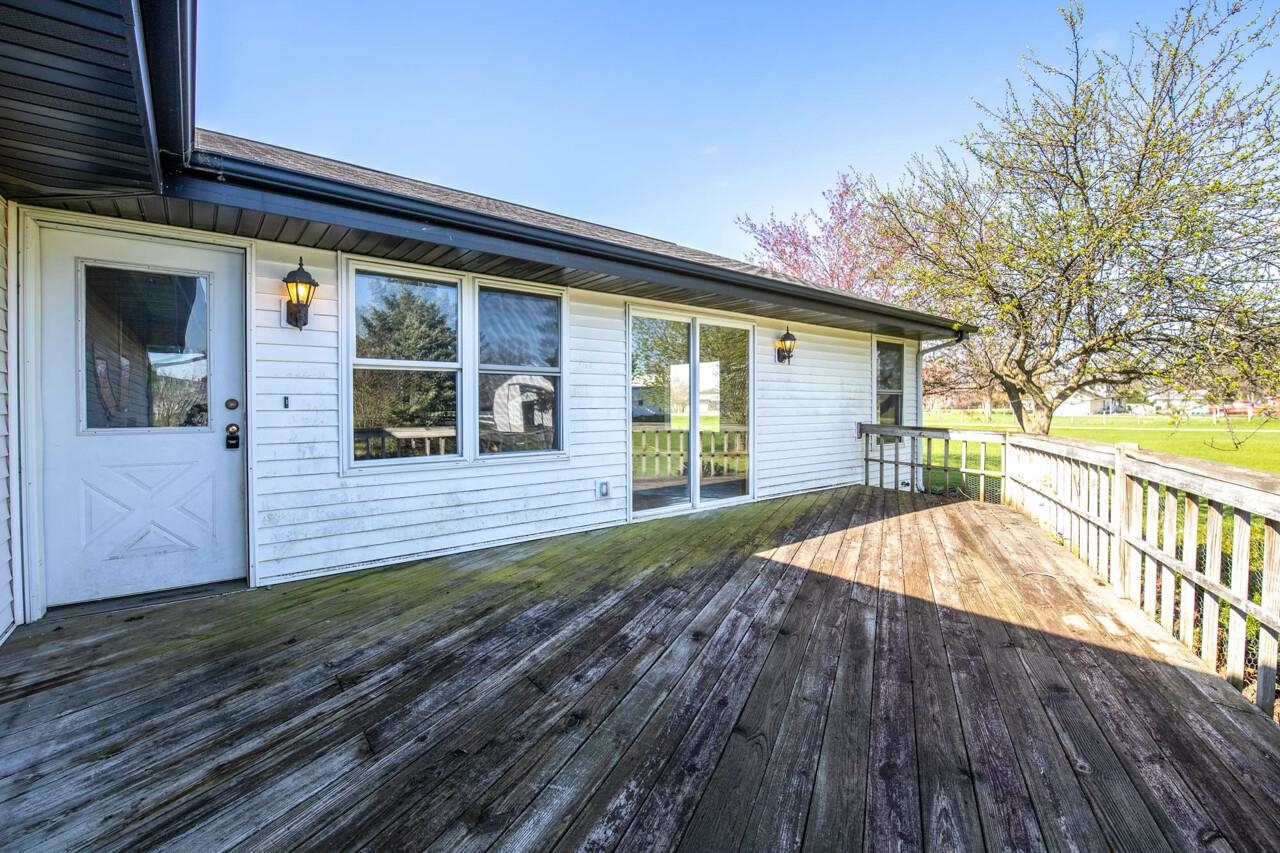 2141 Fischer Road South Beloit, IL 61080 - Photo 3 of 25 a front view of a house with a porch