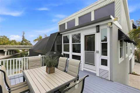 an aerial view of a house with a swimming pool