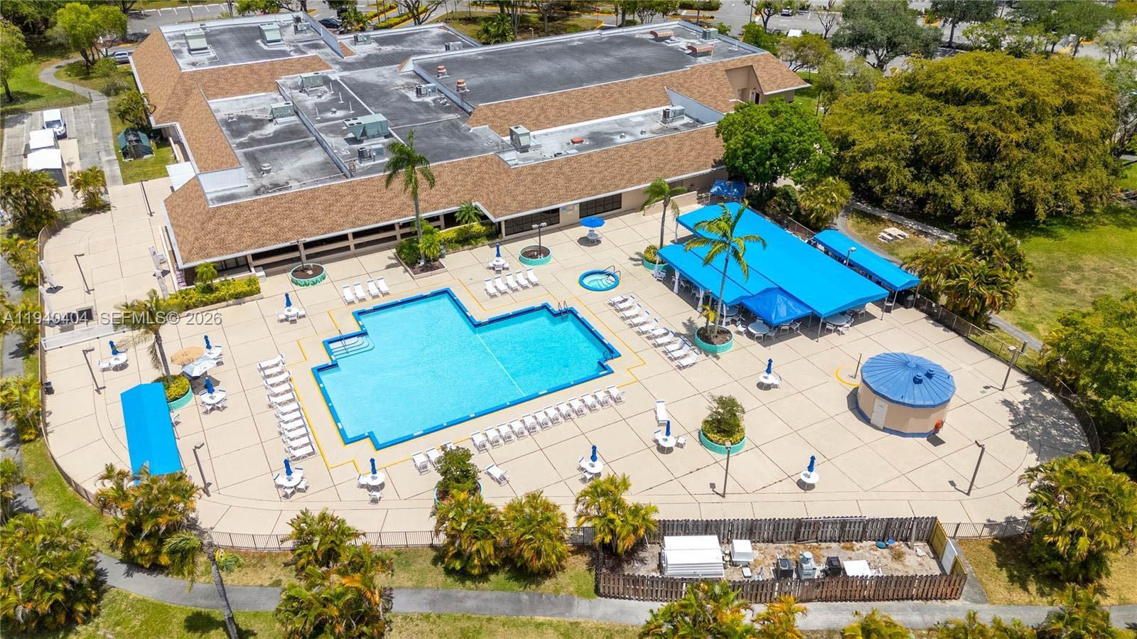 2541 North Nob Hill Road, Unit 309 Sunrise, FL 33322 - Photo 18 of 31 an aerial view of a house a yard and lake view