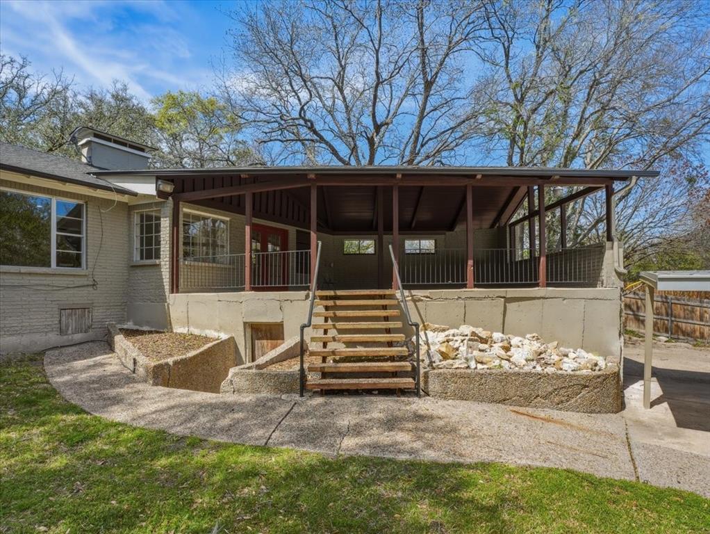 3863 Clayton Road East Fort Worth, TX 76116 - Photo 35 of 39 a front view of a house with a yard