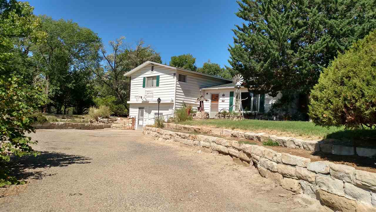 835 25 Road Grand Junction, CO 81505 - Photo 1 of 1 a view of a house with a yard