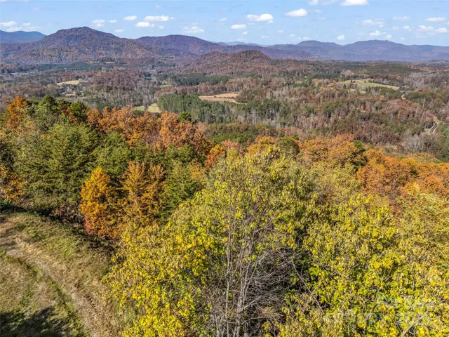 a view of mountains and valleys