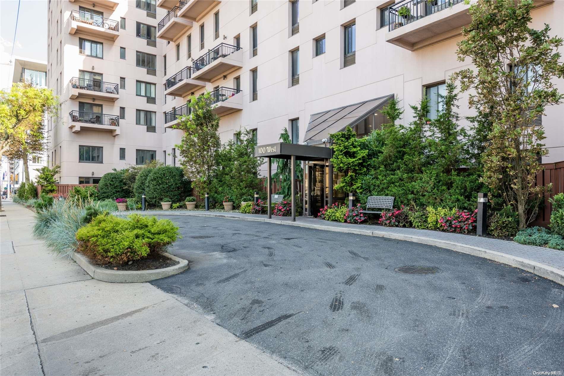 100 West Broadway, Unit 3D Long Beach, NY 11561 - Photo 1 of 1 a view of a building with a garden