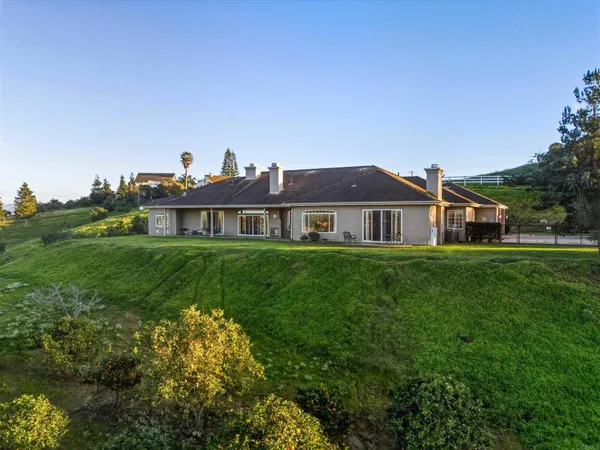 a house view with a garden space