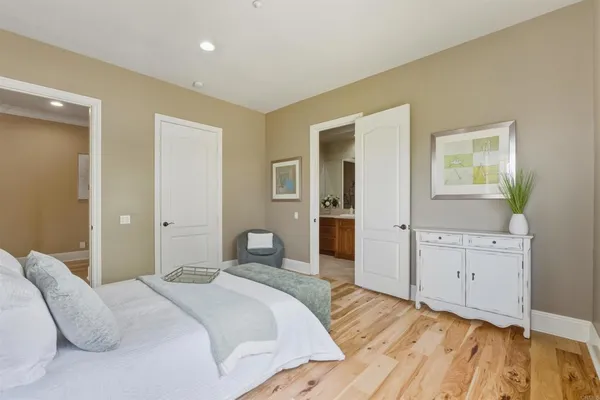 a bedroom with a bed and a dresser