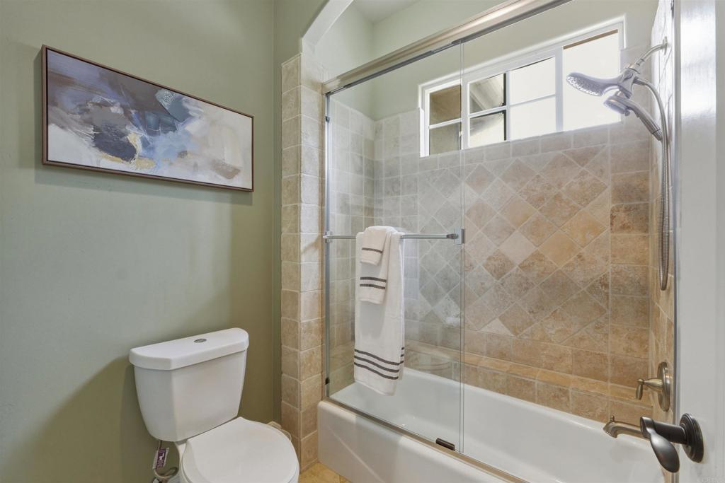 4712 Briana Court Fallbrook, CA 92028 - Photo 31 of 40 a bathroom with a toilet and a shower