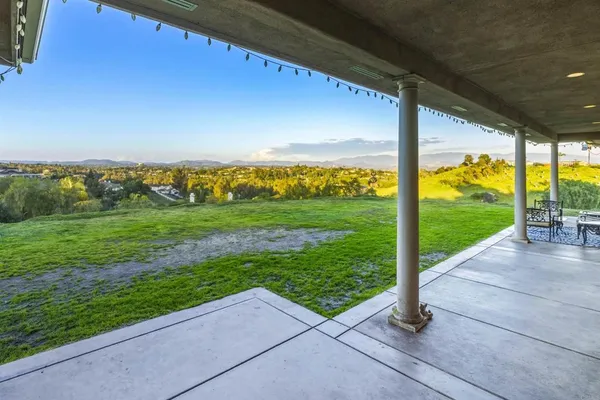a view of a garden with an outdoor space
