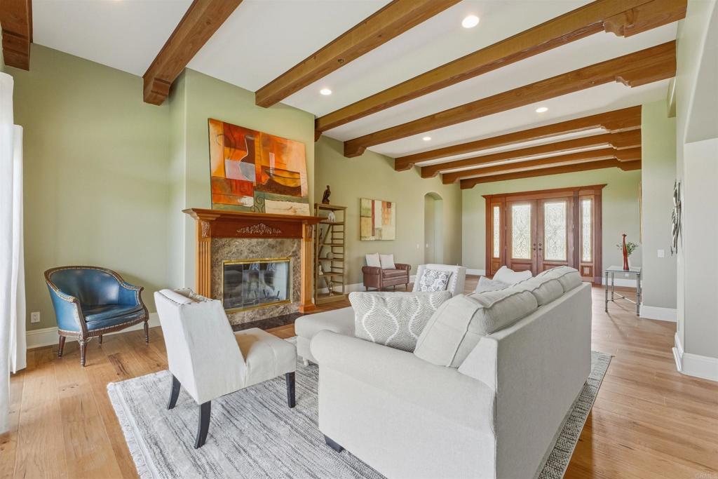 4712 Briana Court Fallbrook, CA 92028 - Photo 9 of 40 a living room with furniture and a fireplace