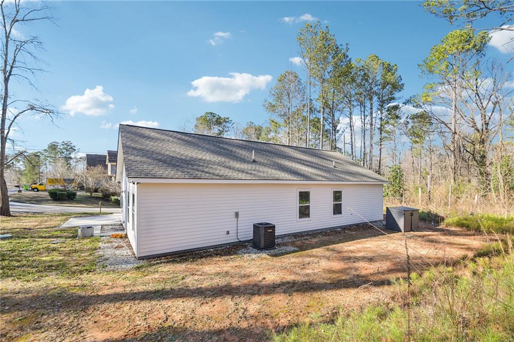 985 Timber Trail Austell, GA 30168 - Photo 14 of 15 a view of a house with a snow in the yard