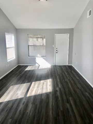 a view of an empty room and window