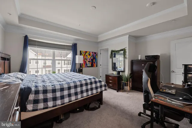 a bedroom with a bed piano and a window