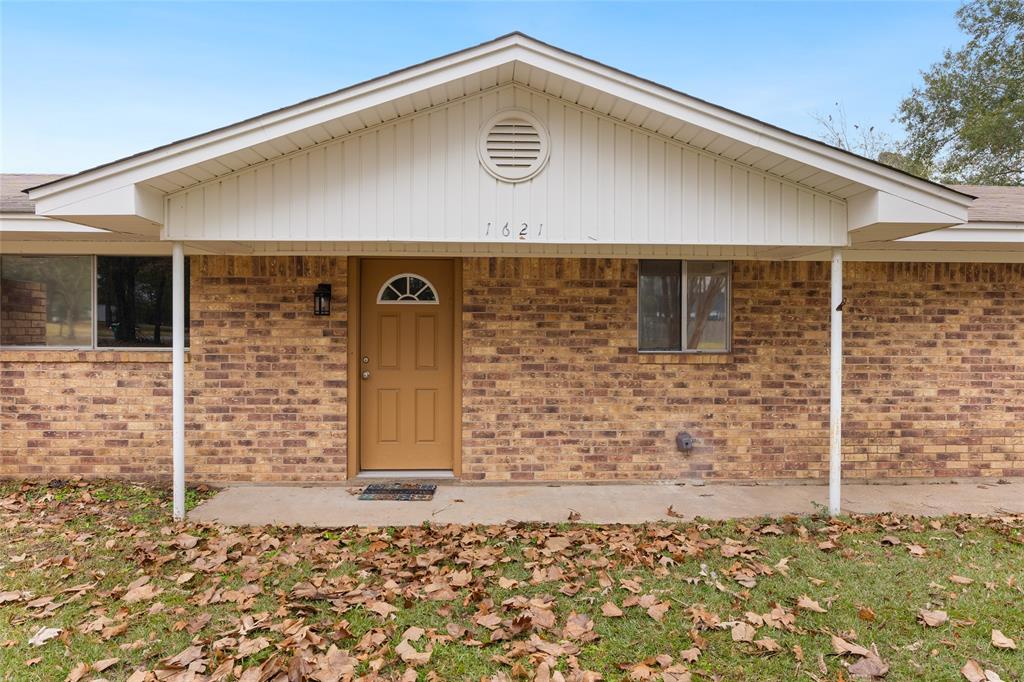 1621 Baseball Loop Diana, TX 75640 - Photo 2 of 38 a front view of a building