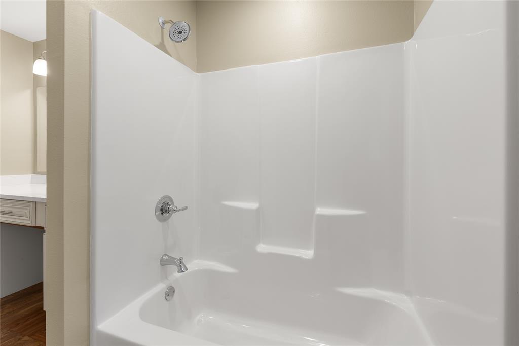 1621 Baseball Loop Diana, TX 75640 - Photo 21 of 38 a close up of a bathtub