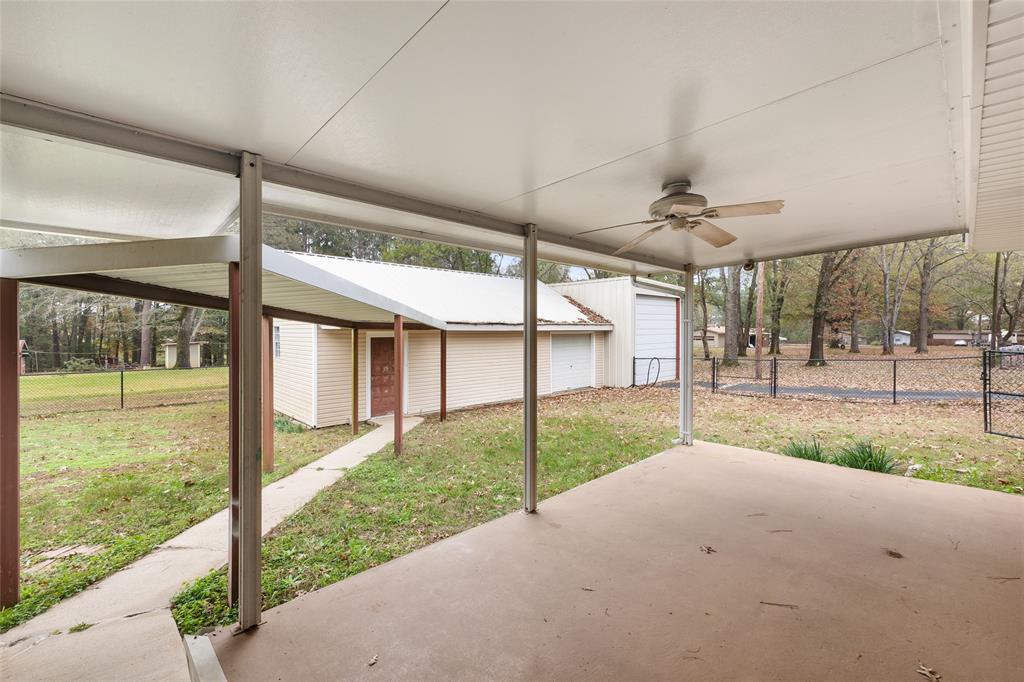 1621 Baseball Loop Diana, TX 75640 - Photo 27 of 38 a view of a porch and garden