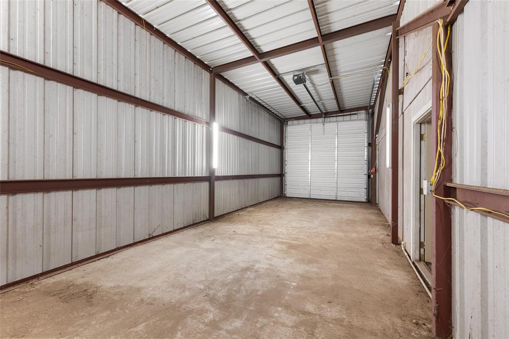 1621 Baseball Loop Diana, TX 75640 - Photo 30 of 38 a view of an empty room with a window