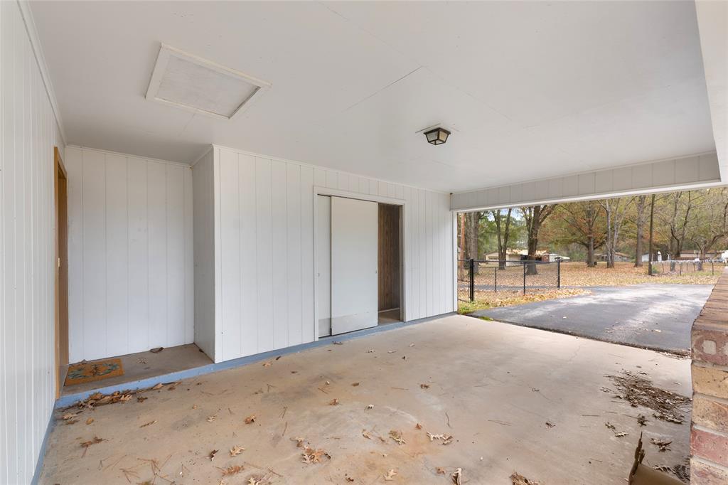 1621 Baseball Loop Diana, TX 75640 - Photo 34 of 38 a view of a bedroom with a large window