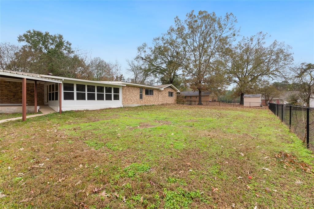 1621 Baseball Loop Diana, TX 75640 - Photo 36 of 38 a view of a house with yard and sitting area