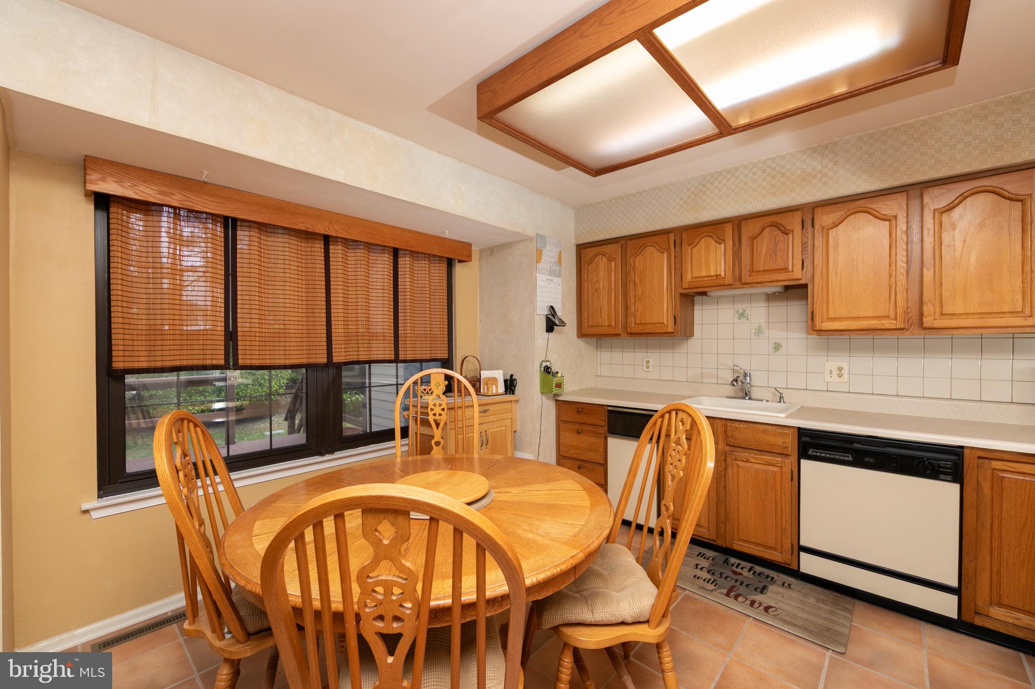 1 Crofton Commons Cherry Hill, NJ 08034 - Photo 13 of 40 a view of a dining room with furniture window and outside view