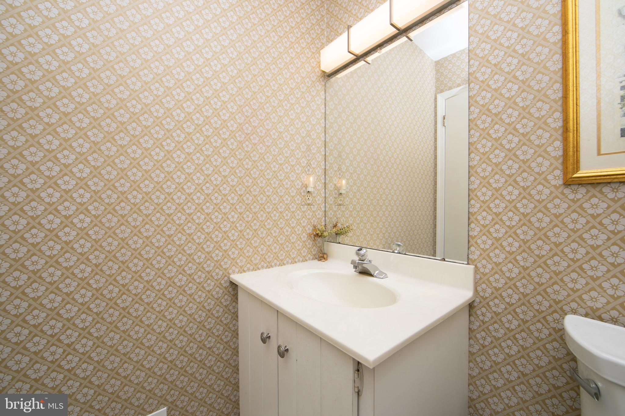 1 Crofton Commons Cherry Hill, NJ 08034 - Photo 15 of 40 a bathroom with a sink a toilet and mirror