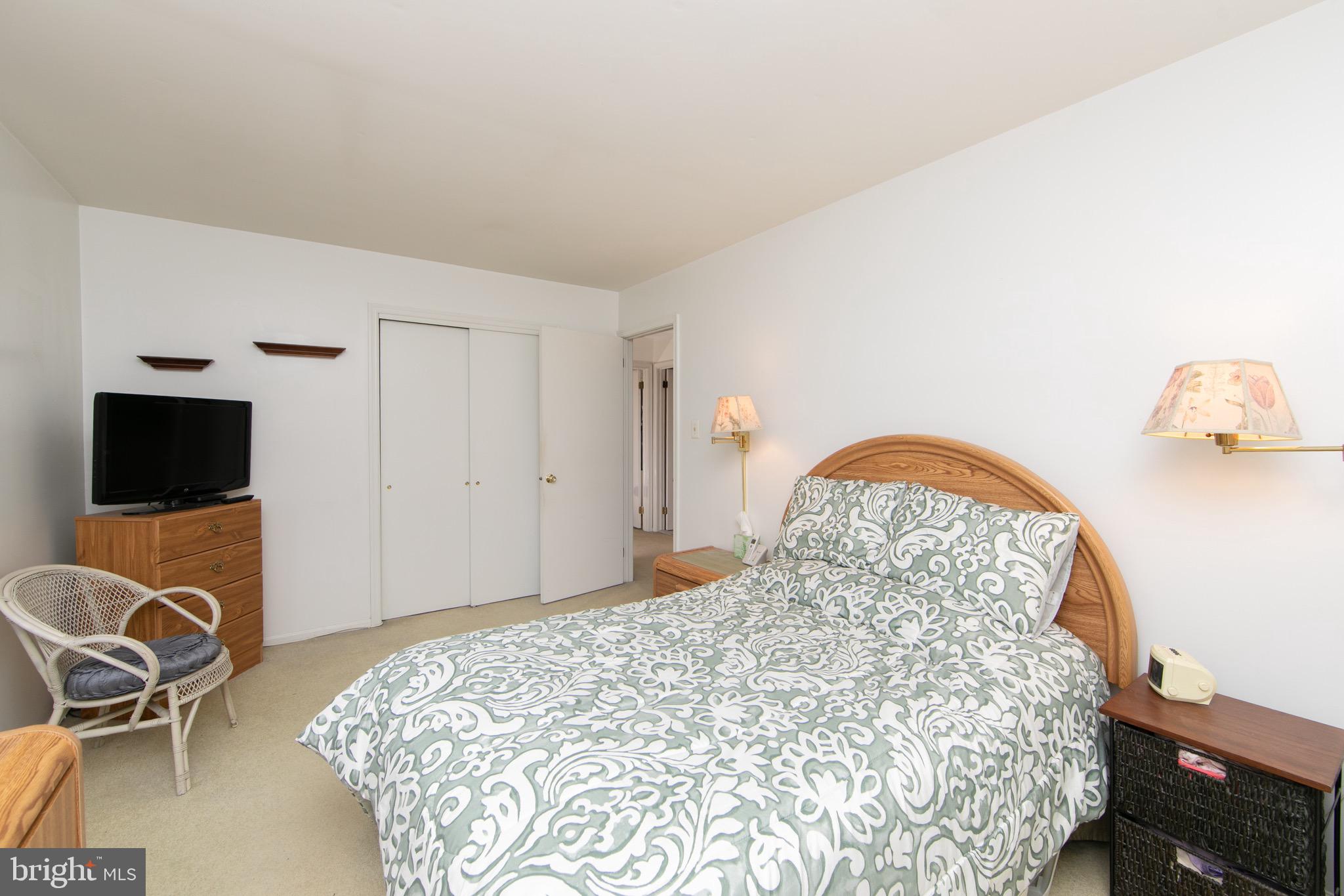 1 Crofton Commons Cherry Hill, NJ 08034 - Photo 22 of 40 a bedroom with a bed and a flat screen tv