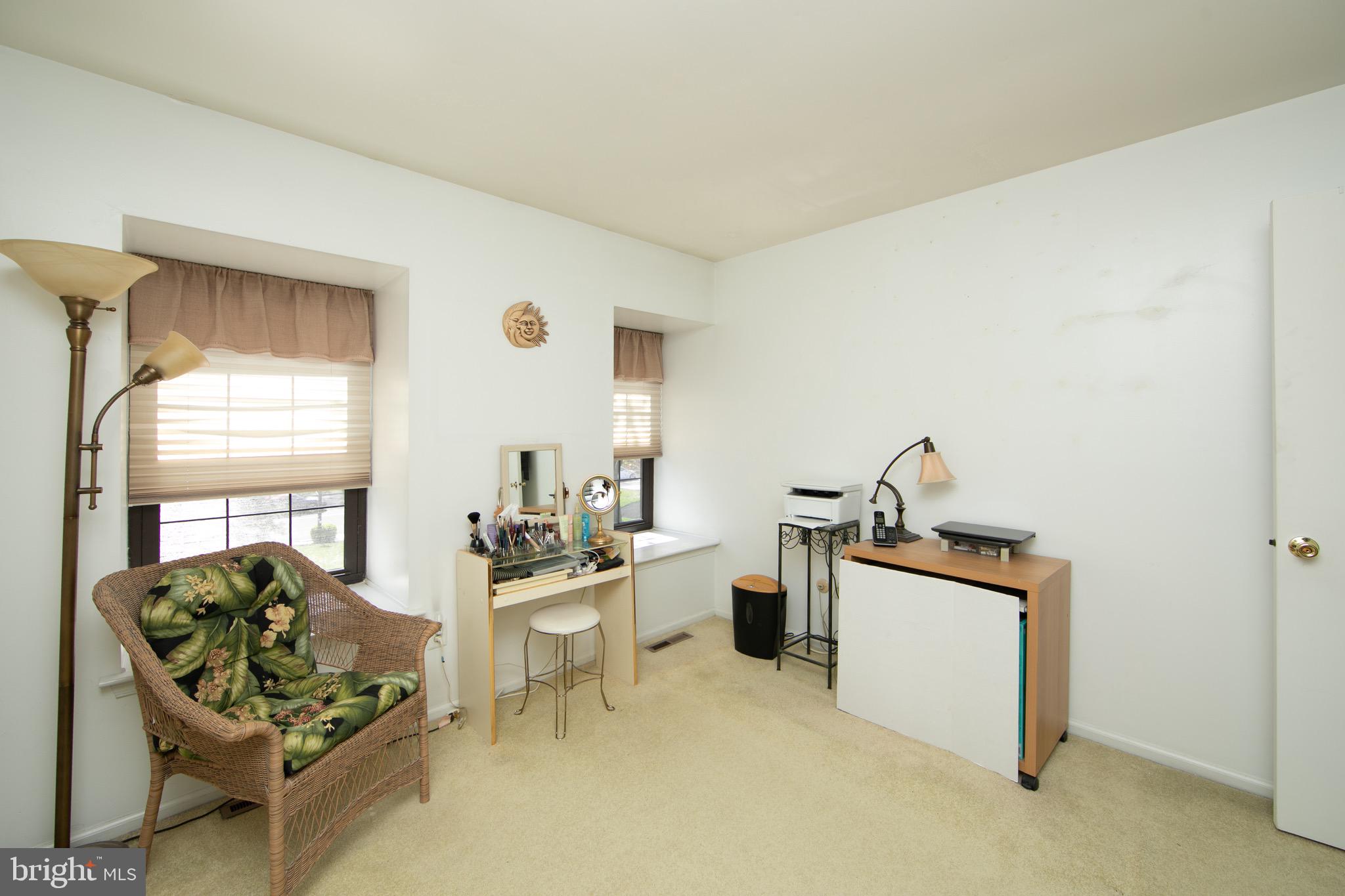 1 Crofton Commons Cherry Hill, NJ 08034 - Photo 24 of 40 a living room with furniture a window and gym equipment