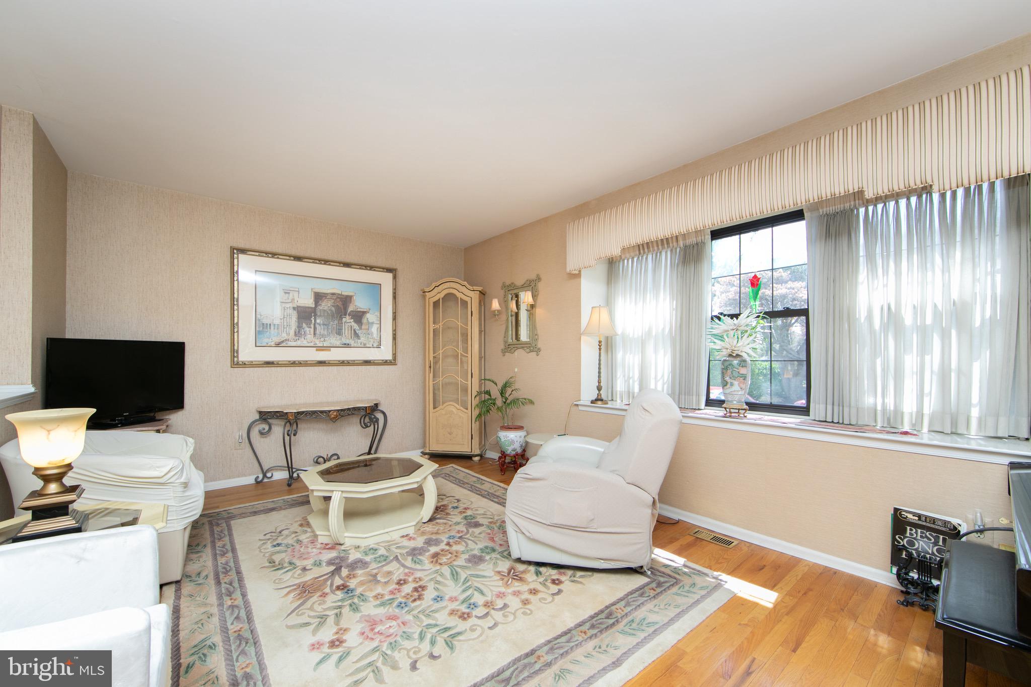 1 Crofton Commons Cherry Hill, NJ 08034 - Photo 3 of 40 a living room with furniture a rug and a window